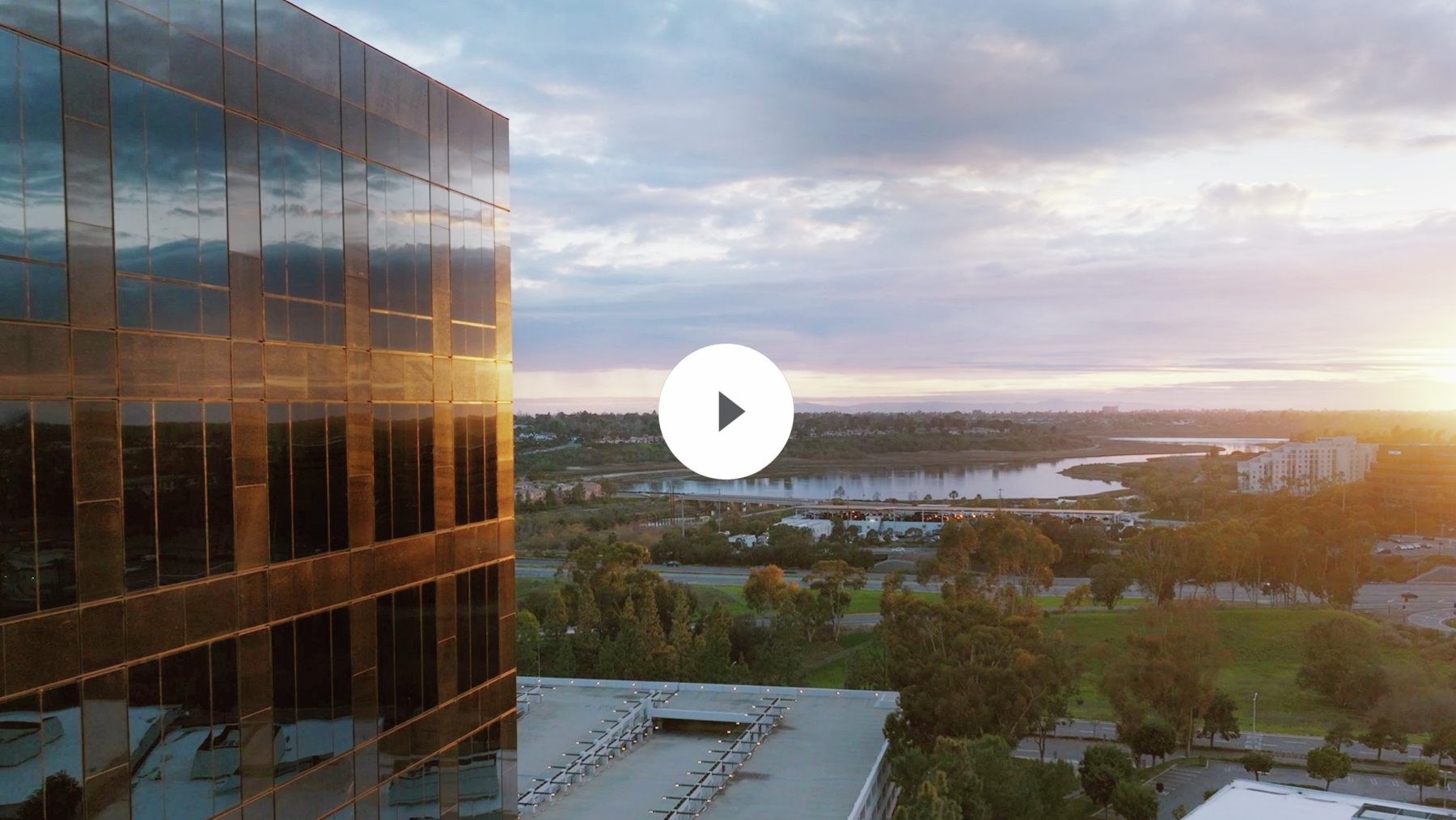 Play Button for the Airport Area property video in Orange County, CA.
