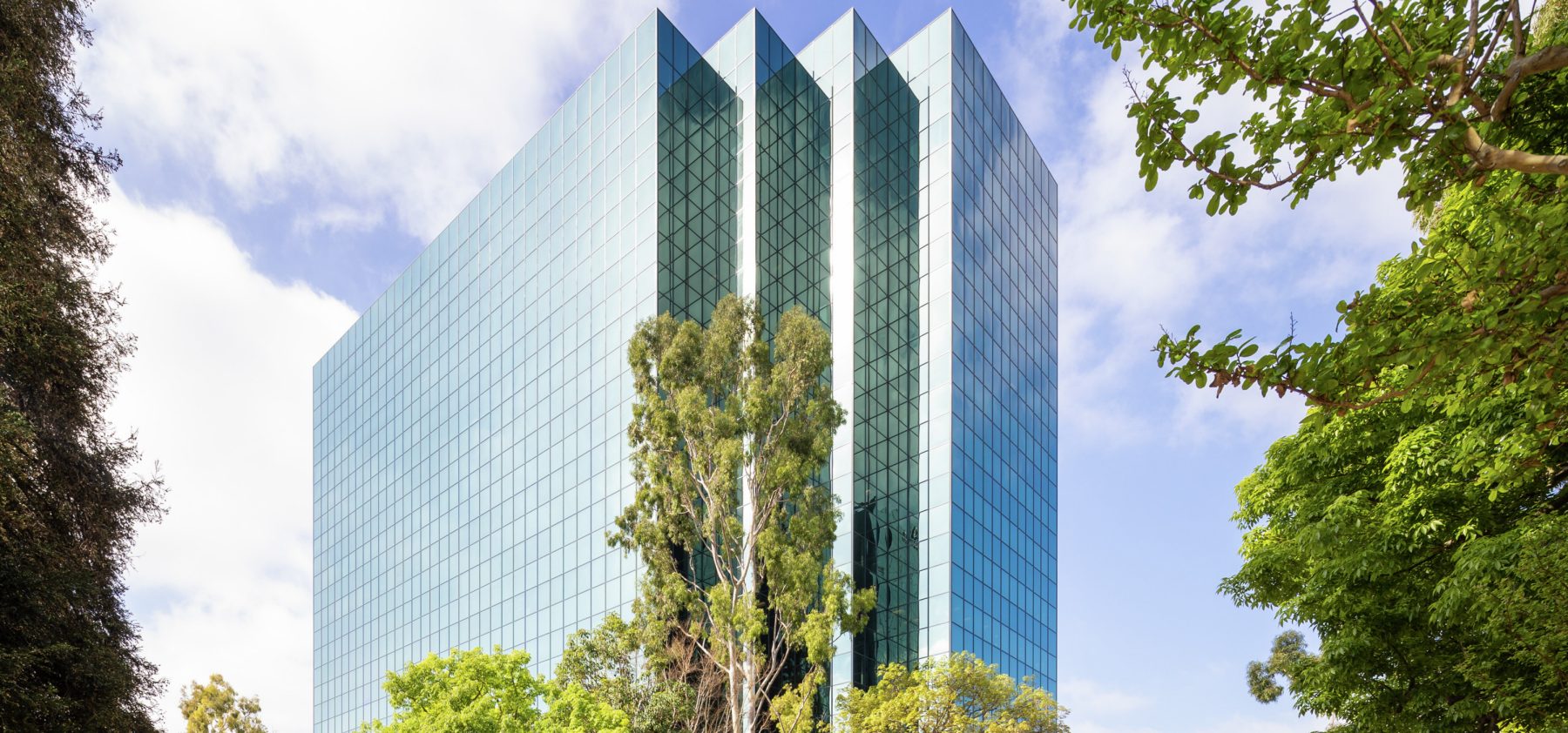 Exterior view of 3200 Park Center Drive at Pacific Arts Plaza in Costa Mesa, CA.