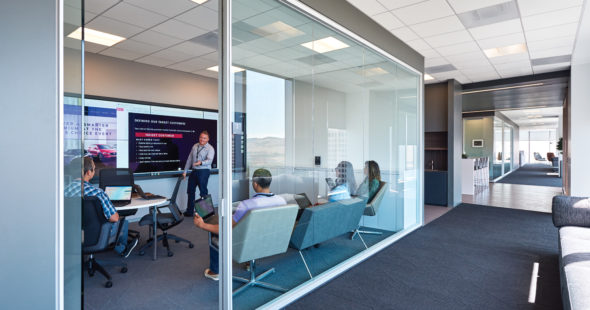 Office suite interior photography of Mazda employees meeting in a conference room