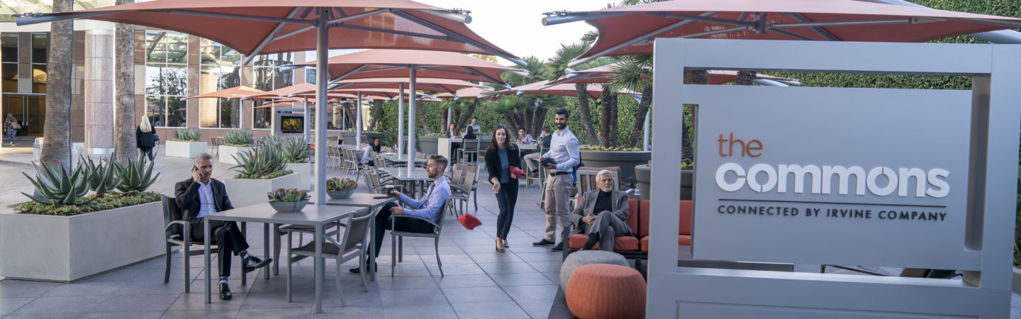 Photography of people enjoying The Commons, an outdoor workplace and gathering area, at Fox Plaza in Los Angeles, CA