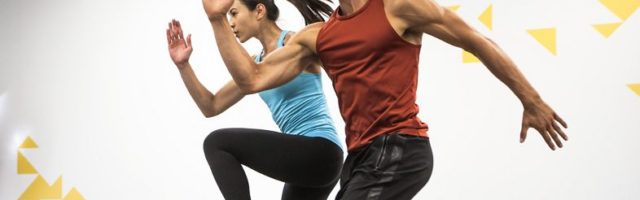A man and woman exercising at a KINETIC® Fitness Center