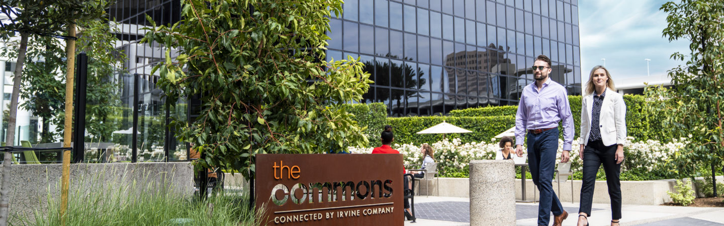 Photography of people enjoying The Commons, an outdoor workplace and gathering area, at Irvine Towers in Irvine, CA
