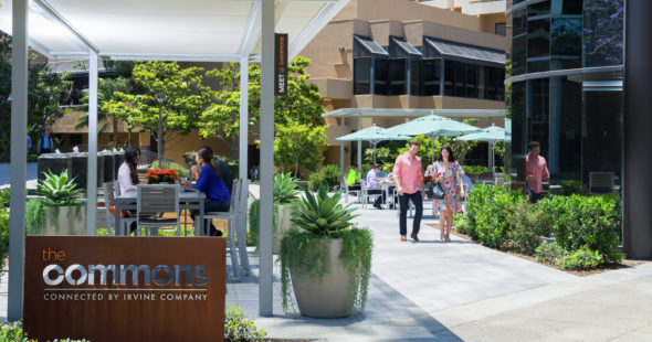 Photography of people enjoying The Commons, an outdoor workplace and gathering area, at La Jolla Square in San Diego, CA
