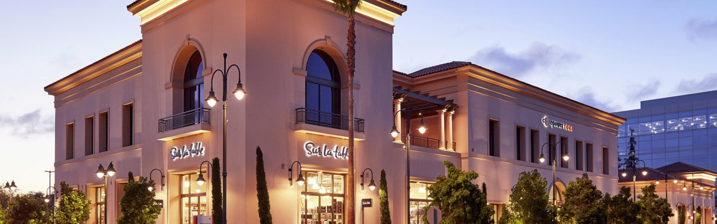 Photo of some of the retail shops at Santa Clara Square Marketplace, including Sure la Table and Corepower Yoga in Santa Clara, CA