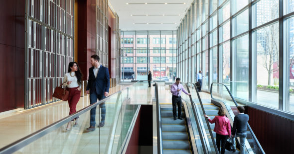 Lifestyle photography of the escalator in 300 North LaSalle, Chicago, IL