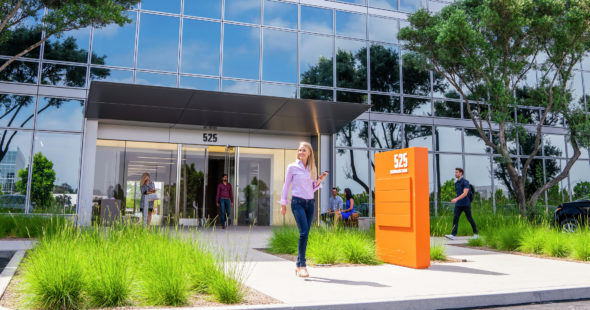 Lifestyle photography of Discovery Park - 525 Technology building entry in Irvine, CA