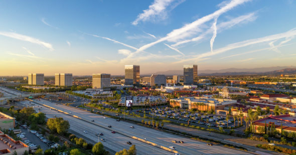 Aerial photography of the Irvine Spectrum area featuring snowy mountains in Irvine, CA